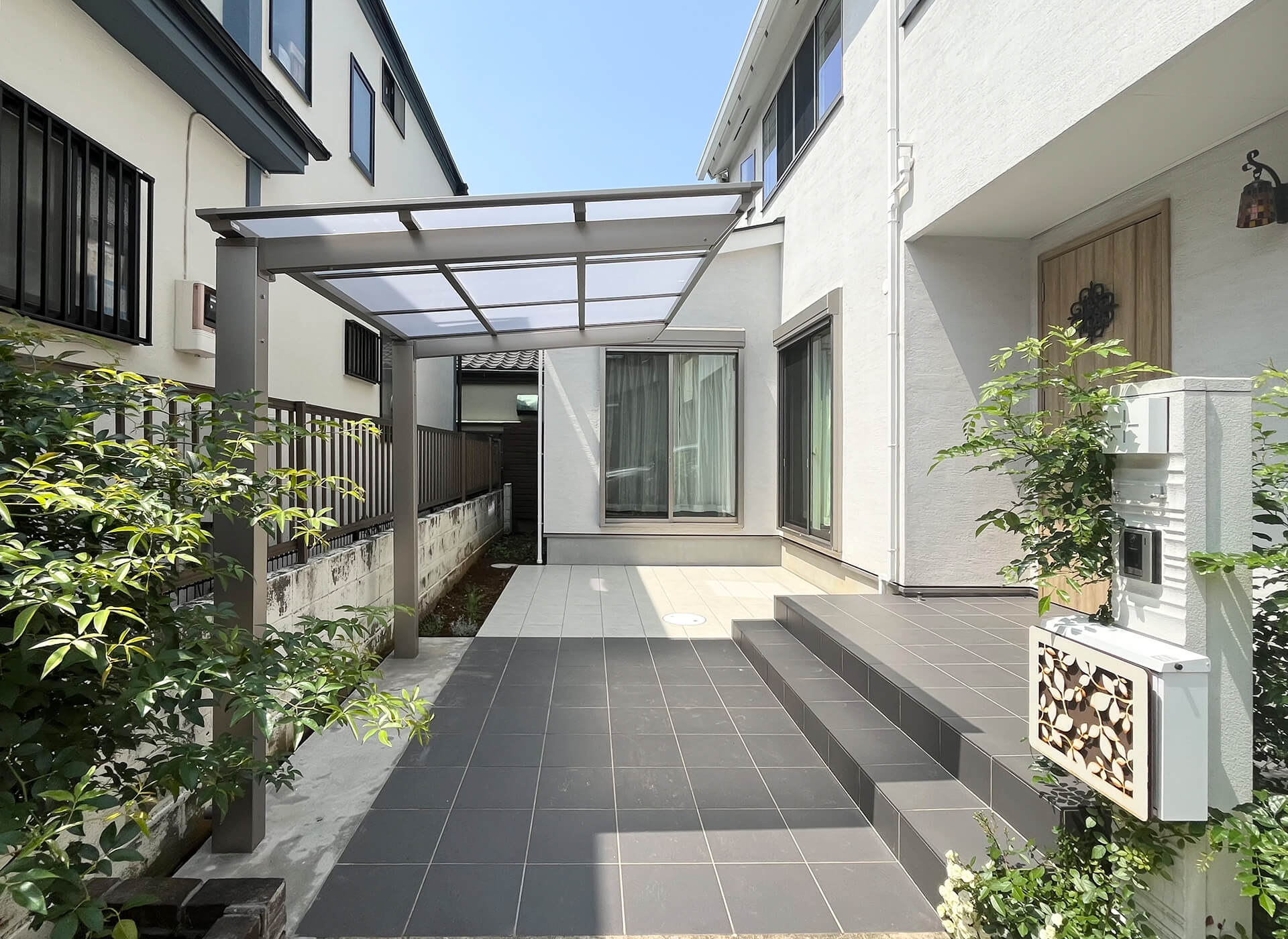 弊社が建築した築8年の住宅にお部屋を増設、サイクルポートなども設置